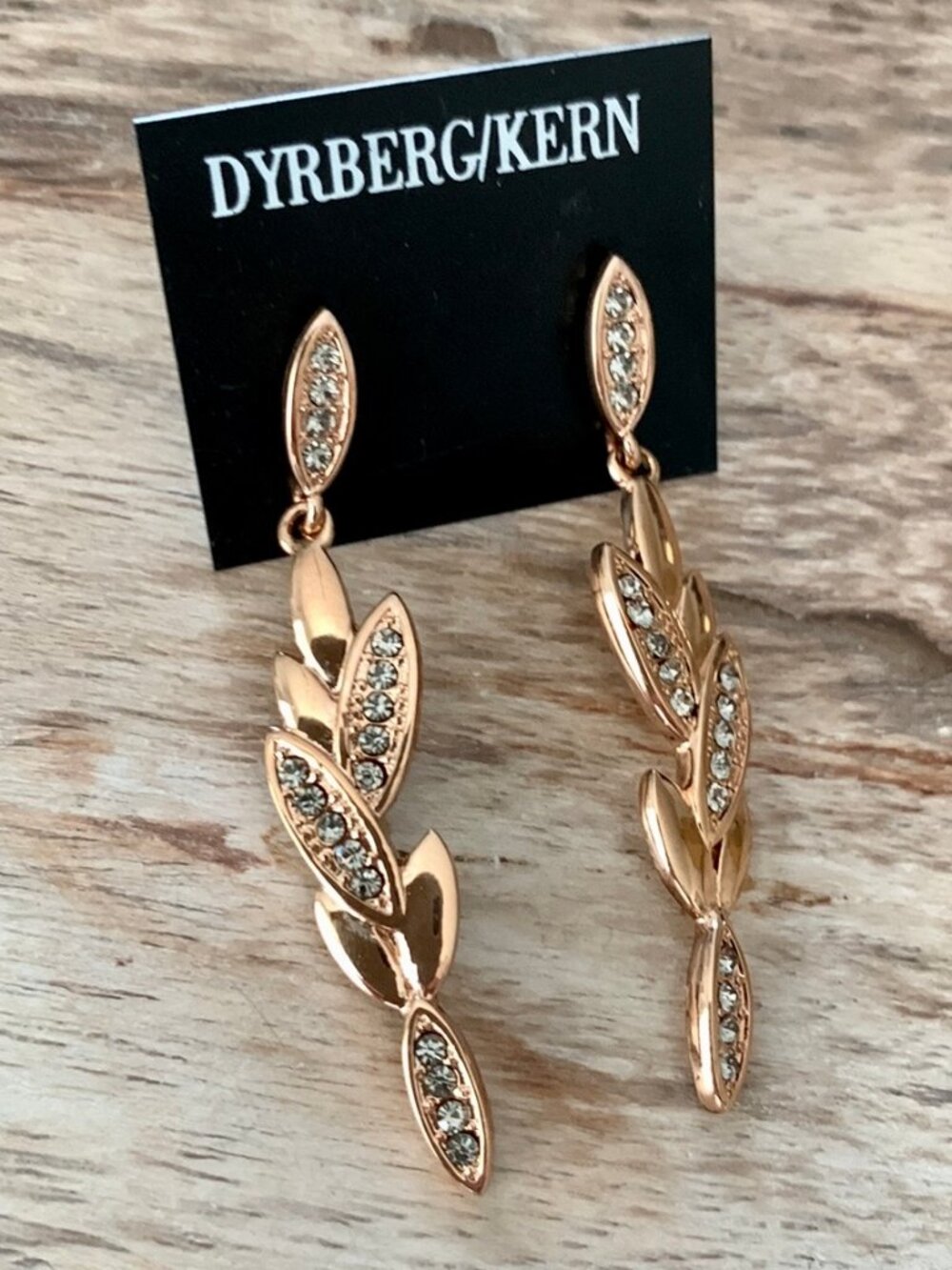 Dyrberg/Kern Akanda Rose Gold and grey Swarovski crystal lotus flower earrings
